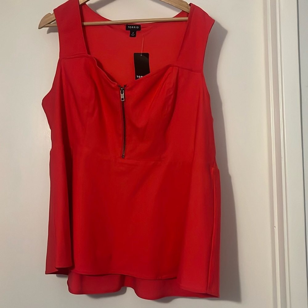 Torrid peplum zipper top size 2